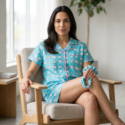 Two-piece pajama shorts set — On Model - Seated | Generated by Modelize